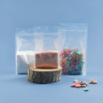 Load image into Gallery viewer, Clear Flat Bottom Pouch with Tear Notch &amp; Resealable Zip - Titan Packaging
