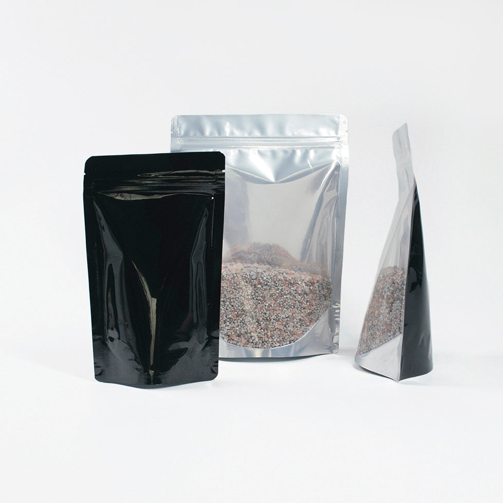 Clear/Foil/Black Stand Up Pouches With Resealable Zip & Tear Notch - Titan Packaging