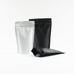 Load image into Gallery viewer, Matte Black &amp; White Stand Up Pouch with Resealable Zip &amp; Tear Notch - Titan Packaging