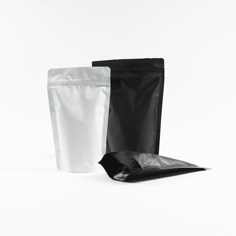 Matte Black & White Stand Up Pouch with Resealable Zip & Tear Notch - Titan Packaging