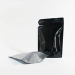 Load image into Gallery viewer, Metallic Black, Silver &amp; White Stand Up Pouches 1KG With Zip &amp; Tear Notch - Titan Packaging